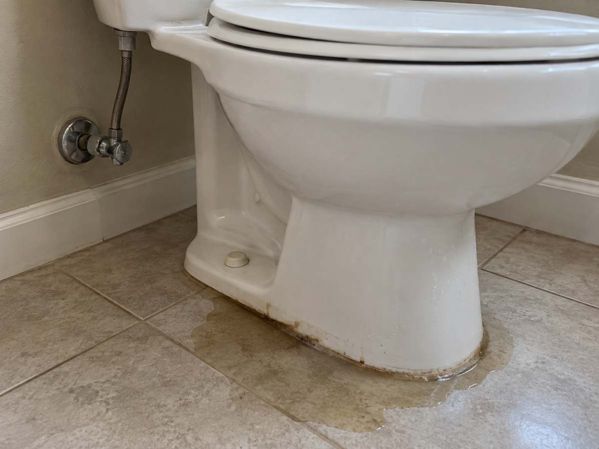 Before — Leaking toilet